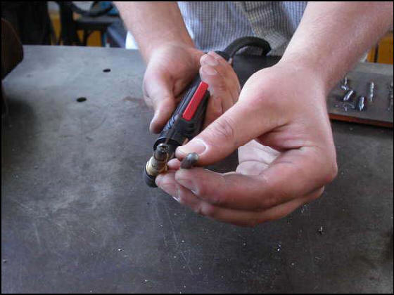 MIG welding torch tip fused closed